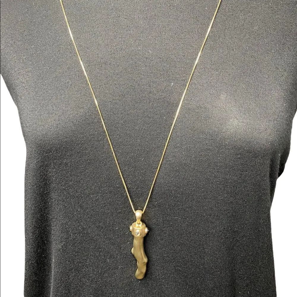 Chicos gold pendant with black and white crystals adjustable 18” -22” chain